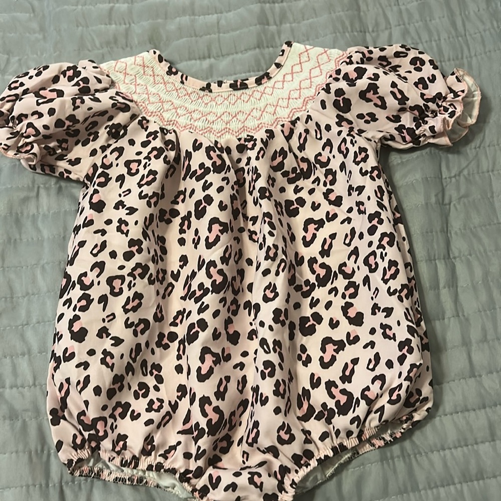 Pink animal print Romper with smocking!